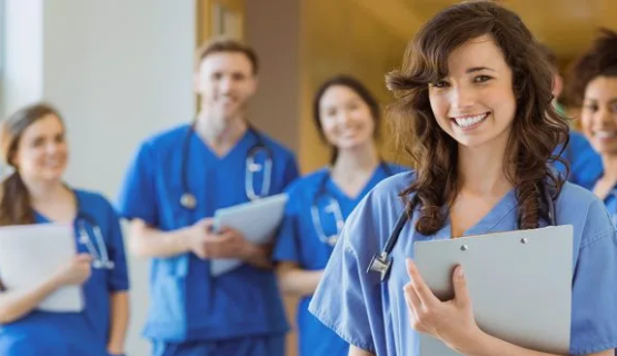 Smiling nurse holding clipboard