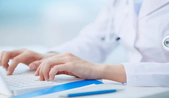 Healthcare professional using computer