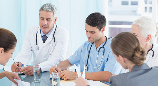 Medical team meeting discussion.