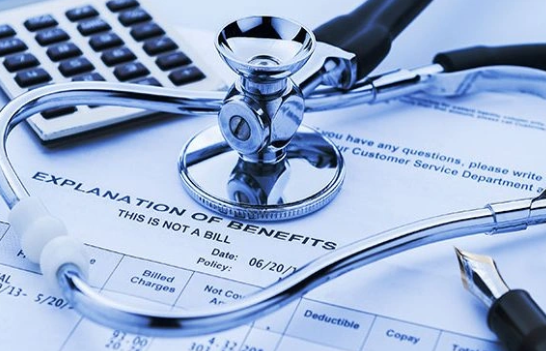 Stethoscope on billing documents